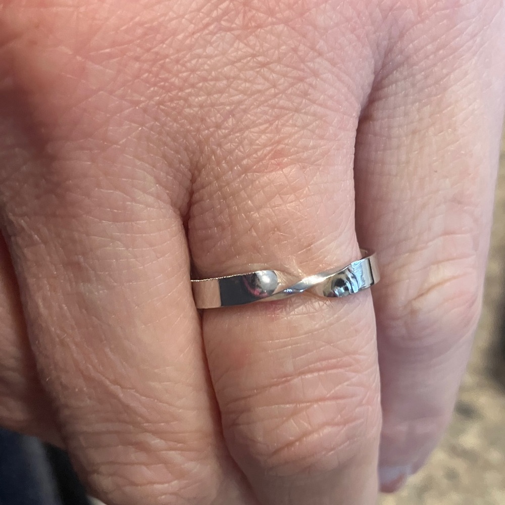 Elegant Silver Twist Ring